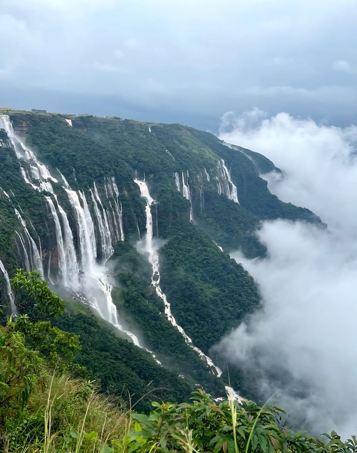 Seven Sisters waterfalls tumbling over the misty cliffs of Cherrapunjee